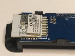 Zigbee ZTU Module on TH08 Sensor PCB Zigbee ZTU module on a sensor board, with visible electronic components and QR code.