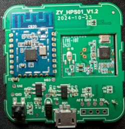 Printed circuit board (PCB) with electronic modules and a micro USB connector.