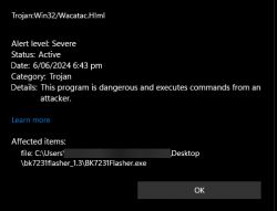Screenshot of a Windows Defender alert about the detection of Trojan Win32/Wacatac.H!ml.