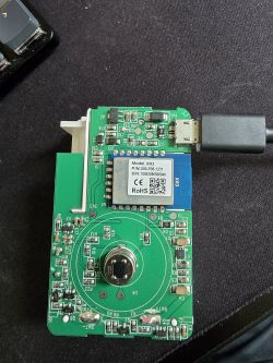 XR3 PIR sensor with visible circuitry and USB connection.