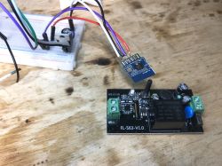 FL-S63-V1.0 relay board with soldered WiFi module wires.