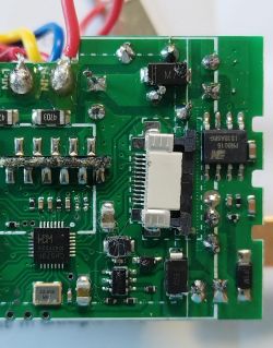 Circuit board with various electronic components.