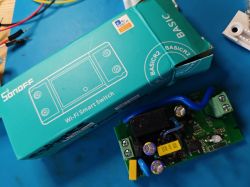 Box and module of Sonoff BasicR2 Wi-Fi Smart Switch.