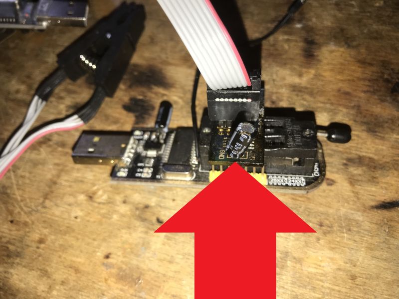 CH341 module with electrolytic capacitor connected and SPI cable attached