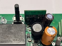 Close-up of a device's mainboard with visible electronic components.