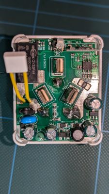 Interior of Akai Energy Smart Plug Close-up of the opened interior of a smart plug with visible PCB and components.