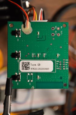 Printed circuit board with various components and connectors, labeled Tuya GB.