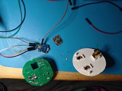 Electronic circuits on a workbench with connecting cables.