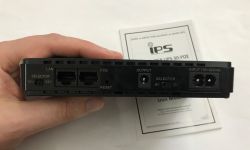 Rear panel of a mini UPS with LAN/PoE ports, DC output, 9/12 V and 15/24 V selectors, and AC input