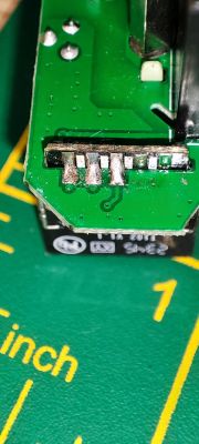 Interior of an Electronic Device Close-up of the interior of an electronic device showing PCB elements.