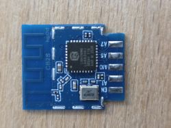 Blue PCB module with a PCB antenna and IC; solder pads on the right labeled A7, A5, A10, A1, EN.