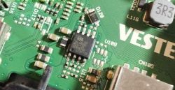 Close-up of a TV motherboard showing electronic components.
