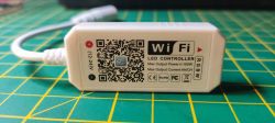 WiFi LED controller Magic Home with a label and QR code.