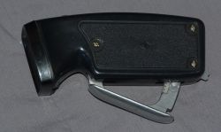 Black Soviet dynamo flashlight with a metal crank.