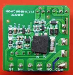 Green PCB with electronic components and labeled terminal and part names.