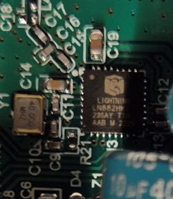 Close-up of the LIGHTNING LN882HK integrated circuit on a printed circuit board.