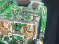 Interior of a Smart Plug with Circuit Board Close-up of the interior of a smart plug showing the circuit board and electronic components.