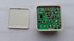 Electronic Module with Open Casing Green electronic module circuit board with open casing.