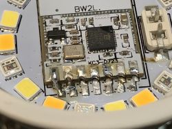 WiFi Module and LEDs in a GU10 Bulb Close-up of WiFi module and LED chips in a GU10 bulb.