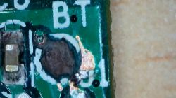 Close-up of a circuit board with markings B and T.