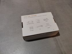 Box with Cheap Garage Door Controller Box containing a cheap garage door controller purchased from Aliexpress.