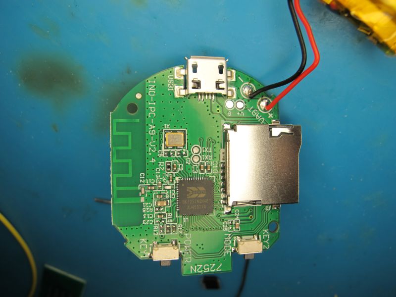 Printed circuit board with electronic components, micro USB connector, and SD card slot.