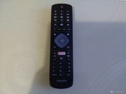 Pilot telewizyjny marki Philips z przyciskiem Netflix.