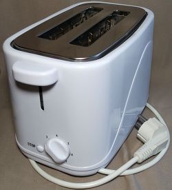 White toaster with two slots and a dial for toast browning control.