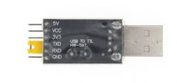 USB to UART converter with visible pins and labels.