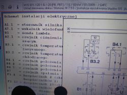 Zdjęcie przedstawia schemat instalacji elektrycznej samochodu z opisem i fragmentem schematu połączeń.