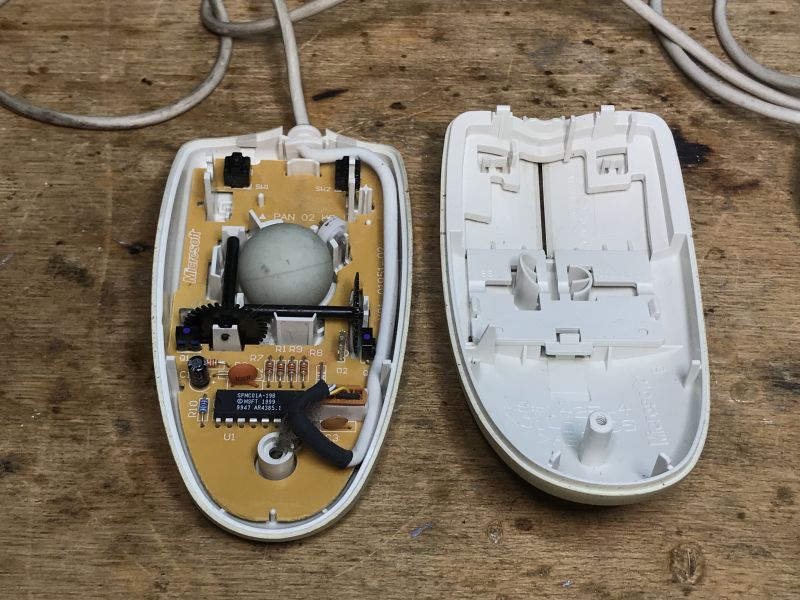 Interior of a Disassembled Ball Mouse Interior of a disassembled ball mouse showing the circuit board and components