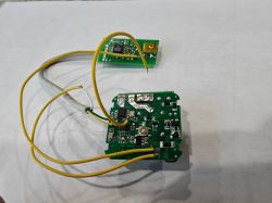 Tuya WiFi Smart Switch Circuits for Modification Tuya WiFi Smart Switch circuits with visible wires and electronic components.