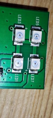 Circuit Board with LEDs Close-up of a circuit board with four white LEDs labeled LED1, LED3, LED5, and LED7.