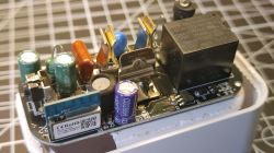 Interior of a TreatLife Smart Plug Close-up of an open smart plug casing with visible electronic components.