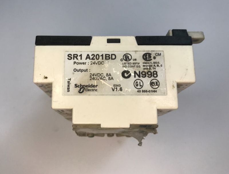 The interior of an old Schneider Electric SR1 A201BD programmable logic controller