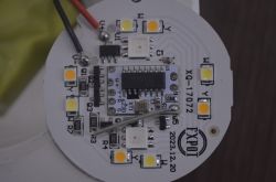 Close-up of an electronic board with LED components and electronic elements.