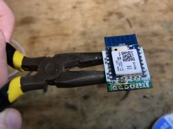 CB3S WiFi Module in Pliers WiFi module CB3S held by pliers