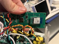 The image shows an electronic circuit board with connected wires and a module labeled as VMS Model.