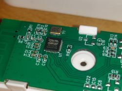 Close-up of a circuit board featuring a BK7231N chip and other components.