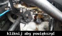 What is leaking from under the throttle and the air filter box? [photos]