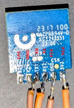 WIFI module with labeled pins 3V3, GND, RX, TX, P24, P26.