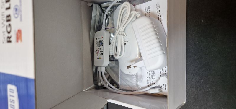 Contents of the LED strip set box with a power supply.