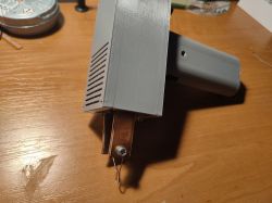 Prototype of a DIY Battery-Powered Soldering Iron DIY battery-powered soldering iron on a workbench.