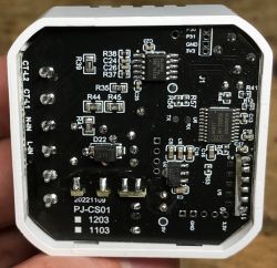 Printed circuit board with electronic components and markings PJ-CS01, including resistors and capacitors.
