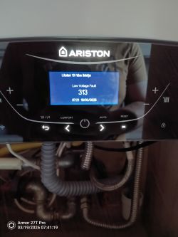 Ariston boiler control panel showing “Low Voltage Fault 313” with date 19/03/2026