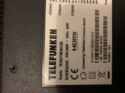 Device label showing TELEFUNKEN, model TE28275B30CXB, and barcodes.