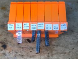 Boxes labeled with electronic components.