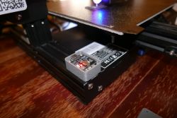 ESP32-C3 Module in Ender 3 Pro Printer ESP32-C3 module connected to Ender 3 Pro printer with a red LED indicator.