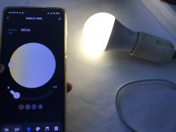 Controlling Tuya Bluetooth LED Bulb with Tuya App Smartphone with Tuya app controlling a Tuya Bluetooth LED bulb.