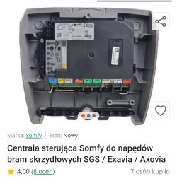 Wnętrze centrali sterującej Somfy do bram skrzydłowych z listwą zacisków i etykietami